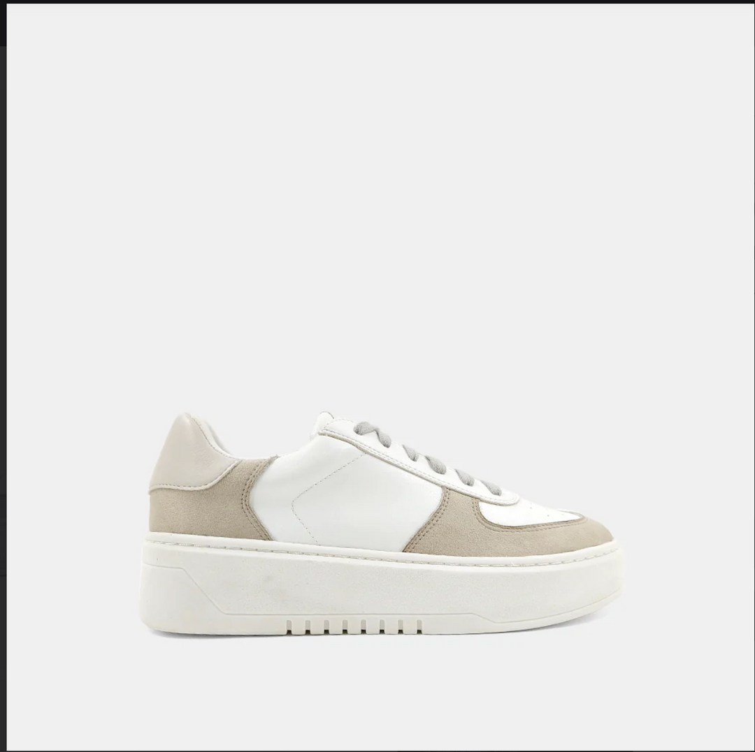 Side view of a white and taupe shoe with a platform sole and laces.
