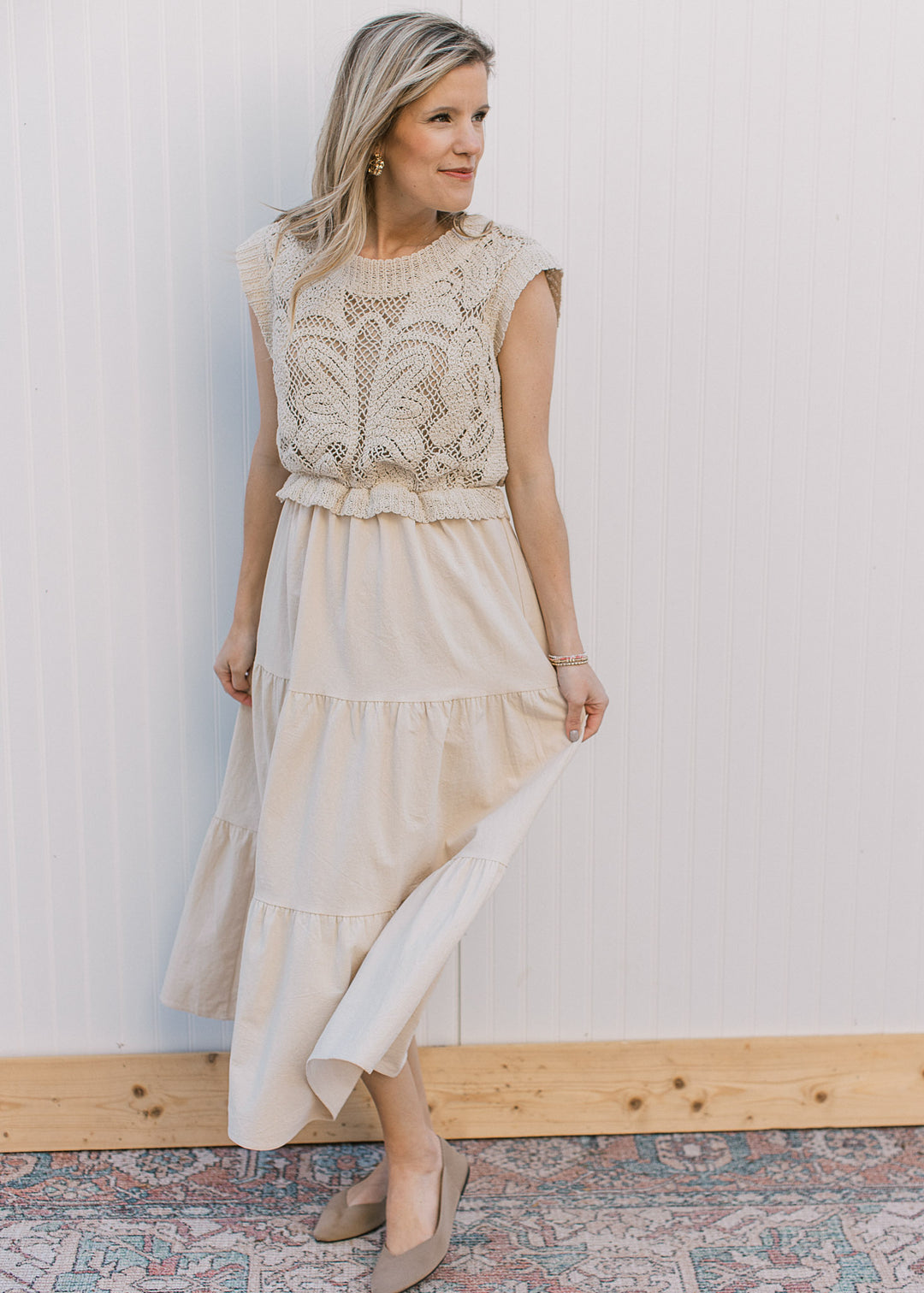 Model wearing flats and a taupe maxi with a lined openwork crochet top and capped sleeves.