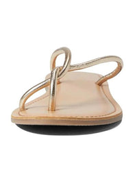 Front view of a shiney gold sandal with a twisted toe strap and a padded sole. 