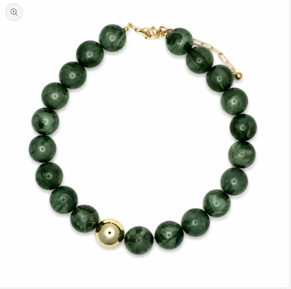 Olive green marbled resin bead necklace with a gold-tone ball accent, lobster clasp and extender chain on white.