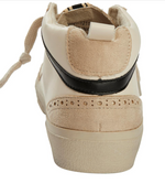 Back view of mid top sneakers with cream tones, black stripe and a star on the outside. 