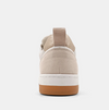 Back view of a cream sneaker with a taupe upper, brown sole and mesh detail.  