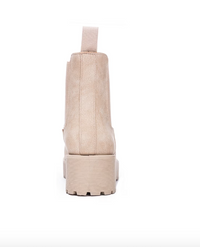back view of natural colored pull on chelsea bootie on white background