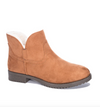 Outside view of a tan bootie lined with faux fur, having a side zip and a 3.5 inch shaft. 