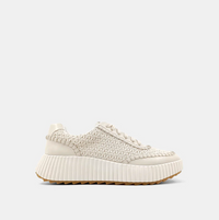 Inside view of cream sneakers made of faux leather with a paneled construction and a topstitch trim.