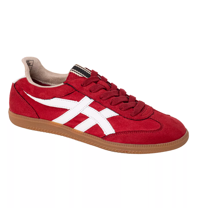 Top view of Deep red suede sneaker with white faux leather stripes, tan sole and red laces. 