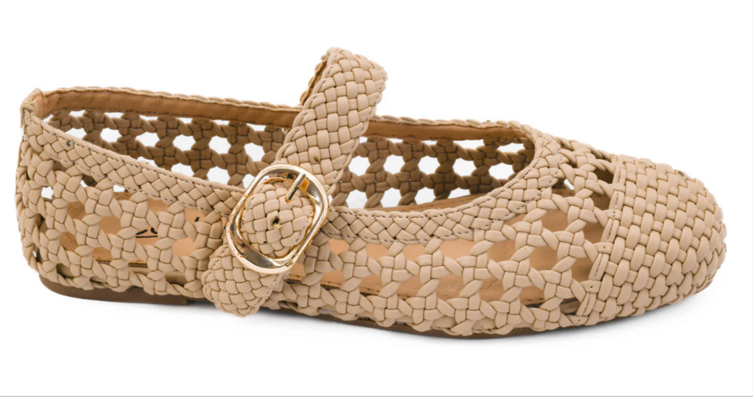 Side view of camel color ballerina flat with a see-through design and strap with gold buckle detail.