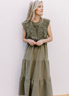 Model wearing a deep olive colored midi with lined openwork crochet top and capped sleeves. 