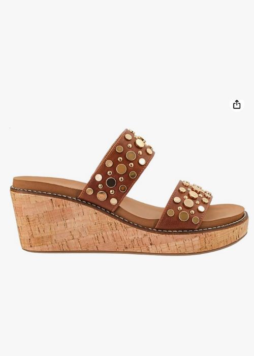 Outside view of a brown double strap 2 3/4”wedge with metal embellishments and slip-on design. 