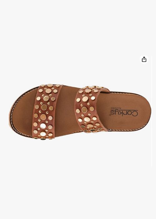 Top view of a brown double strap 2 3/4”wedge with metal embellishments and slip-on design. 