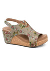 Outside view of taupe floral brocade fabric on a wedge open toe sandal with velcro straps. 