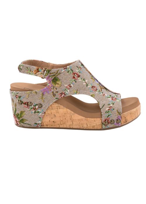 Outside view of taupe floral brocade fabric on a wedge open toe sandal with foam padded foot.