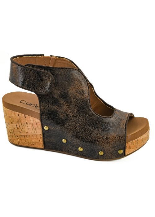Outside view of an expresso colored wedge with an open-toe design and adjustable ankle straps.