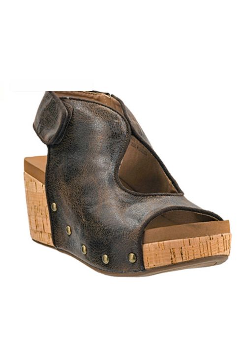 Front view of an expresso colored wedge with an open-toe design and adjustable ankle straps.