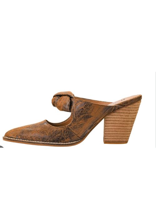 Side view of slip-on cognac shoes with decorative knot detail on the upper and 3.5 inch heel. 