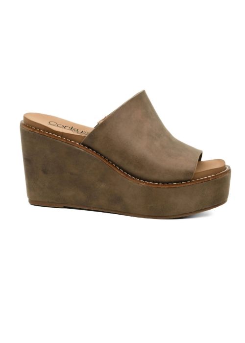 Outside view of tan oil colored sandal with 3.5 wedge heel, slip-on design and cushioned sole. 