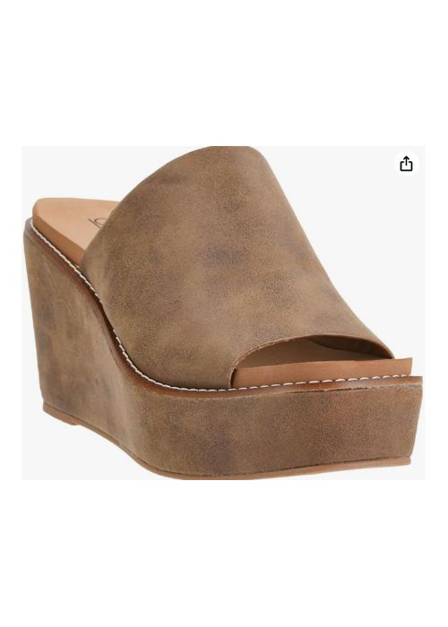 Front view of tan oil colored sandal with 3.5 wedge heel, slip-on design and cushioned sole. 