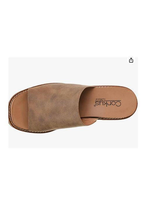 Top view of tan oil colored sandal with 3.5 wedge heel, slip-on design and cushioned sole. 