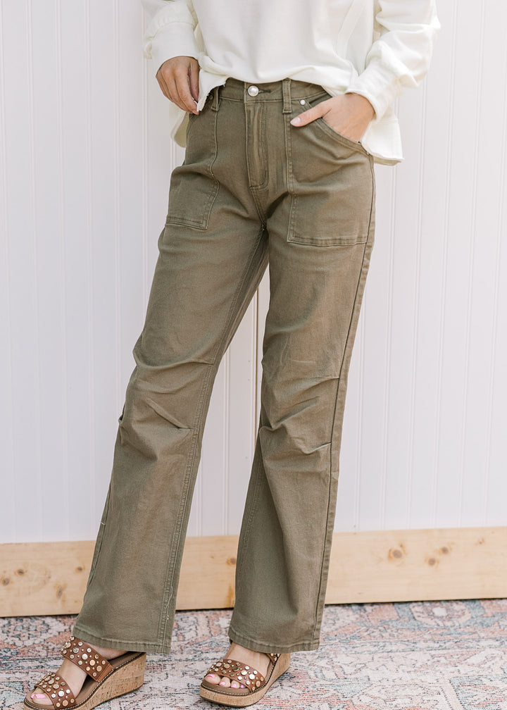 Model wearing olive denim with a straight-leg fit, patch pockets and slight stretch for comfort. 