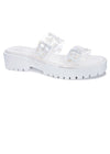 White platform slides with a daisy design on a clear strap and oversized buckles. 