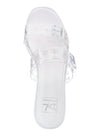 Top view of White platform slides with a daisy design on a clear strap and oversized buckles.