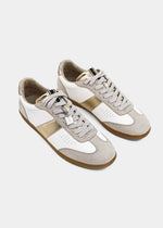 Top view of sneakers with faux leather body, suede uppers, gold trim and camel colored soles.