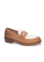 Outside view of a taupe and almond loafer with a flat block heel and coin detail. 