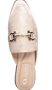 Top view of gold mule  with gold buckle.
