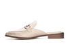 Side view of gold mule with gold buckle with low heel.