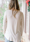 Back view of Bone ivory long sleeve bamboo top on blonde model.
