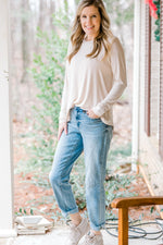 Bone ivory long sleeve bamboo top on blonde model with jeans.