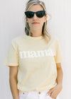 Model wearing all black sunglasses with a black vintage frame. 