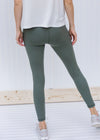 BAck view of sage gray leggings.