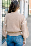Back view of Brunette model wearing sweater with ivory front and Carmel back.