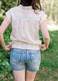 Back view of Judy Blue destroyed denim shorts.
