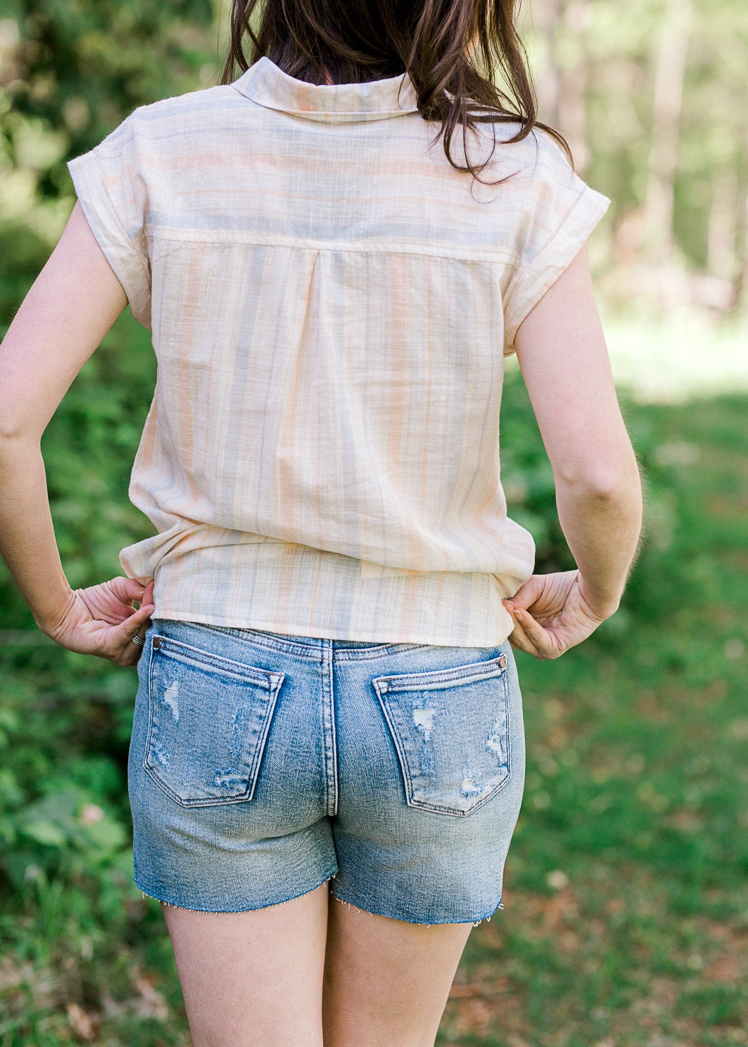 Back view of Judy Blue destroyed denim shorts.