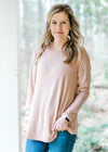 Latte long sleeve bamboo top with round neck on blonde model.