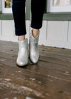 Front view of natural shimmer bootie.