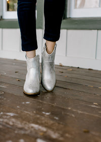 Front view of natural shimmer bootie.
